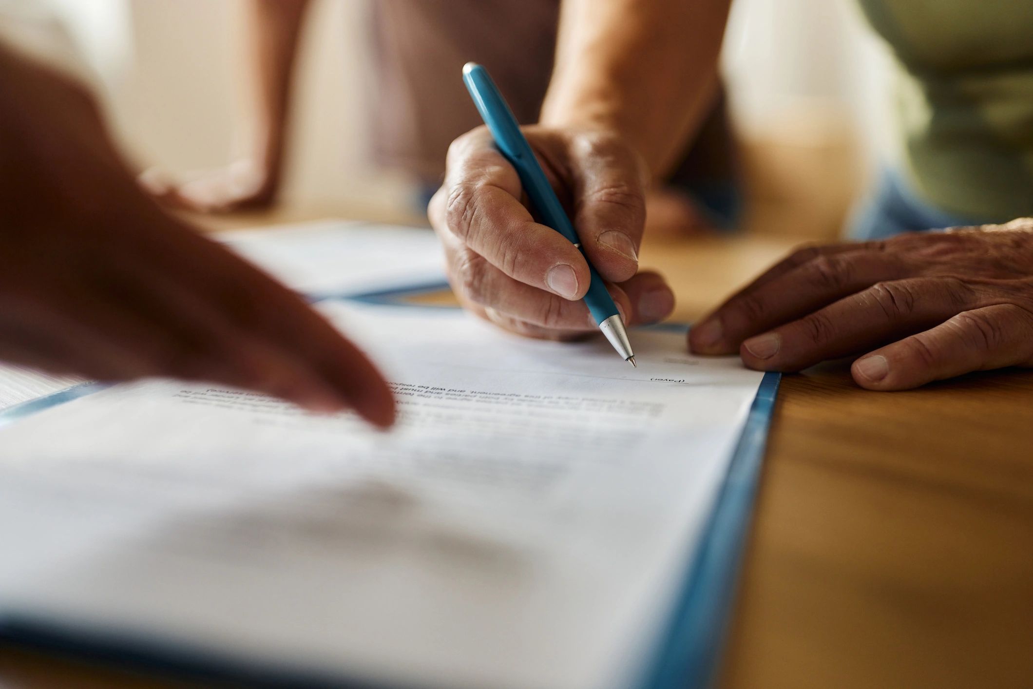 legal documents and pen